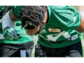 Defensive back Loucheiz Purifoy, shown grabbing a drink during Wednesday's practice, has enjoyed two strong starts with the Saskatchewan Roughriders.