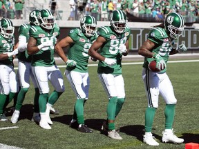 The Riders, led by receiver Naaman Roosevelt, celebrate a touchdown during the 2017 season. The celebrations may get even more creative in 2018 with the CFL easing some of the rules regarding those celebrations.