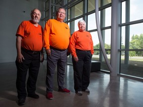 From left, Curt Schroeder, president of Search and Rescue Regina (SARR), Lloyd Goodwill, the organization's past president and Dorothy Rhead, a senior SARR member stand in the RCMP Heritage Centre on Dewdney Avenue.