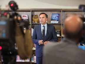 Minister of Finance Bill Morneau speaks to the press at the downtown branch of the Saskatoon Public Library on Sept. 11, 2018, during the Liberal caucus in Saskatoon.