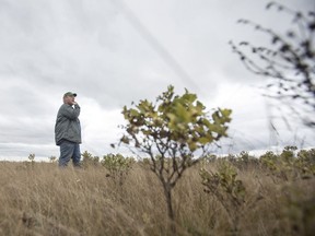 Meewasin Valleu Authority resource management officer Renny Grilz walks though land that lies just north of the Northeast SwaleÕs in Saskatoon, SK on Tuesday, September 18, 2018. The Northeast SwaleÕs protected conservation zone serves as a mating ground for sharp-tailed grouse where they perform their mating dance; the land is slated to be developed into housing one day.