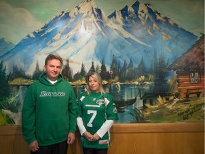Gary Zankl, left, and Karla Zankl stand in front of a mural at the Austrian Club on Maxwell Crescent. The space is being sold and the murals will not be able to be removed from the walls.
