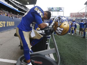 Winnipeg Blue Bombers' Andrew Harris hangs his head during Saturday's Banjo Bowl against the Saskatchewan Roughriders.