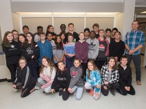 Teacher Brett Matlock, right, and his Grade 7/8 class, who are pictured here at St. Gregory School on Upland Drive, have partnered with the Saskatchewan Union of Nurses to tell the story of youth mental health issues through a documentary.