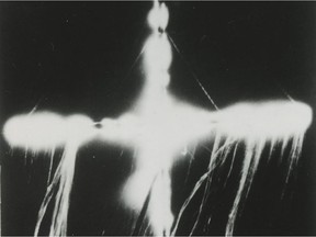 Detail from a 1928 Regina postcard showing a cross burning.