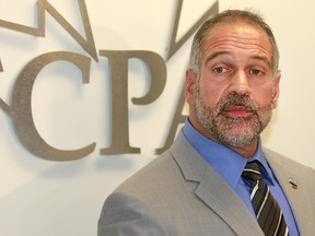 Calgary Police Association president Les Kaminsky speaks to media at a press conference where he called for the resignation of Calgary Police Commission Chair Brian Thiessen. Photo taken on Thursday, September 27, 2018. Dean Pilling/Postmedia