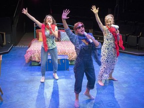 Rebecca Auerbach (as Rosie), left, Jane Cooke (as Donna Sheridan), centre, and Stephanie Roth (as Tanya), right, perform a scene from Mamma Mia! at the Globe Theatre.