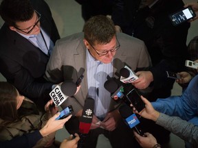 Premier Scott Moe speaks to members of the media during a press conference at the Saskatchewan Legislative Building.