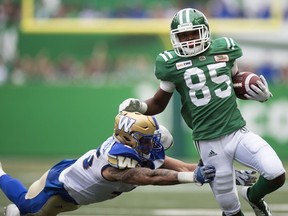 Kyran Moore, 85, had a big game for the Roughriders on Sunday against Winnipeg.