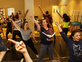 Stephanie Graham (centre right) directs a rehearsal of Mamma Mia, the Globe Theatre's 2018-19 season opener.