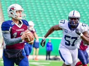 Regina Thunder quarterback Brock Sich, left, threw three touchdown passes against the Edmonton Wildcats on Sunday at Mosaic Stadium.