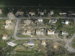 Damage from a tornado is seen in Dunrobin, Ont., west of Ottawa on Saturday, Sept. 22, 2018. The storm tore roofs off of homes, overturned cars and felled power lines in the Ottawa community of Dunrobin and in Gatineau, Que.