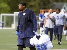 Philip Blake, shown here walking off the field at the Alouettes' training camp, is to start at left guard on Saturday for the Riders against the Blue Bombers.