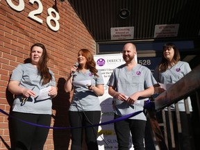 U of S dental students Mary Tait, Kristen Kezar, Christopher Bertsch and Christy MacPherson prepare for the grand opening of the city's first student-run free dental clinic in Saskatoon on Oct. 20, 2018.