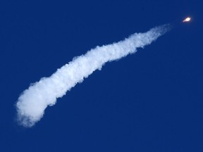 Russia's Soyuz MS-10 spacecraft carrying the members of the International Space Station (ISS) expedition 57/58, Russian cosmonaut Alexey Ovchinin and NASA astronaut Nick Hague, blasts off to the ISS from the launch pad at the Russian-leased Baikonur cosmodrome in Baikonur on October 11, 2018.