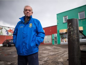 Former Regina mayor Larry Schneider stands on Broad Street near of the location where the Broadway Theatre once stood. Schneider says the street used to be more vibrant in years gone by.