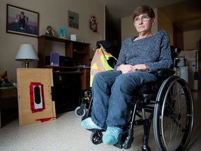 Charlene Eger sits in her home. Eger, who uses a wheelchair, is among a group of people working on a letter writing campaign to the Sask. Human Rights Commission with the hope of putting pressure on the government to create an accessible service to replace STC.