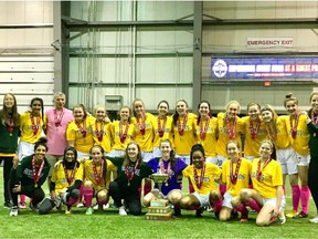 The Campbell Tartans celebrate their Regina High Schools Athletic Association 3A girls soccer title Wednesday at the AffinityPlex.