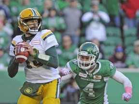 Saskatchewan Roughriders linebacker Cameron Judge zeroes in on Edmonton Eskimos quarterback Mike Reilly on Monday. Judge ended up registering one of Saskatchewan's five sacks in its 19-12 victory.