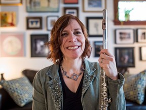 Former RCMP officer Marie-Véronique Bourque sits with her flute in her Regina home on Sept. 25, 2018. Bourque is about to launch her debut album as a jazz musician with a heavy emphasis on French repertoire.