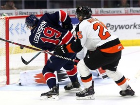 Jake Leschyshyn of the Regina Pats shoots the puck past Medicine Hat Tigers goalie Jordan Hollett during WHL action at the Brandt Centre on Friday.