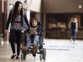 Alix Norum (left) is the recipient of the 2018 Regina Young Humanitarian of the Year Award for her lifelong dedication to helping others, which includes her work with the University of Regina's Astonished! program where she mentors people with complex physical disabilities, like Kaitlyn Hoar.