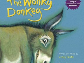 This cover image released by Scholastic shows "The Wonky Donkey" by Craig Smith and illustrated by Katz Cowly. The 2009 picture story has been out-selling Bob Woodward's "Fear" and Rachel Hollis' "Girl, Wash Your Face" among others, thanks to a viral video of Scottish grandmother Janice Clark reading Craig Smith's "The Wonky Donkey" to her grandson. (Scholastic via AP)