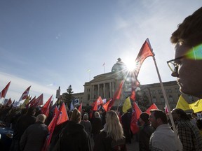 Several labour groups rallied Oct. 25 in front of the Legislative Building in Regina.