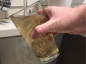 Water from a kitchen sink in Regina's Lakeview neighbourhood Monday night. The discolouration is caused by inspection work on the high-diameter loop that runs around the city.