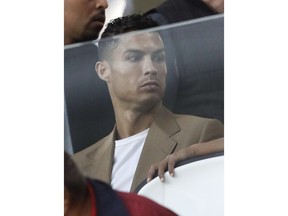 Juventus forward Cristiano Ronaldo attends a Champions League, group H soccer match between Juventus and Young Boys, at the Allianz stadium in Turin, Italy, Tuesday, Oct. 2, 2018. A lawyer for a Nevada woman alleging that soccer star Cristiano Ronaldo raped her in Las Vegas in 2009 said Tuesday her client was "emotionally fragile" and agreed to an out-of-court financial settlement nine years ago because she never wanted her name made public.