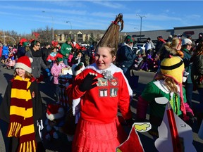 People fill the street at the Santa Claus Parade held on South Albert St. in Regina, Sask. on Sunday Nov. 20, 2016. MICHAEL BELL