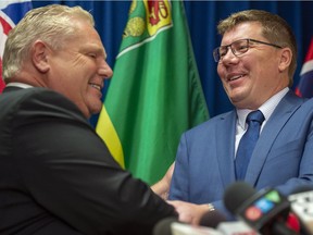 Ontario Premier Doug Ford and Premier Scott Moe in Saskatoon on Thursday, Oct. 4, 2018.