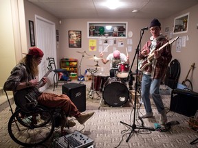 Members of the band Unfazed practice in the basement of a Regina home. From left is rhythm guitarist Bryson Bolianatz, drummer Drew Osborne and lead guitarist and singer Tanner Bolianatz.