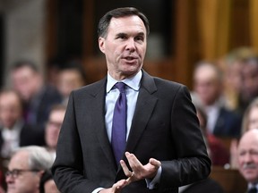 Minister of Finance Bill Morneau rises during Question Period in the House of Commons on Parliament Hill in Ottawa on Monday, Nov. 19, 2018.