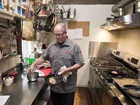 Chef Chad Forrest keeps busy in his kitchen at the Little Red Cafe in Mortlach.