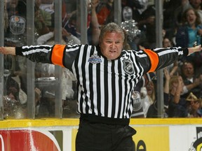 Regina-born Mick McGeough, shown refereeing in the 2006 Stanley Cup final, died late Friday night at age 62.