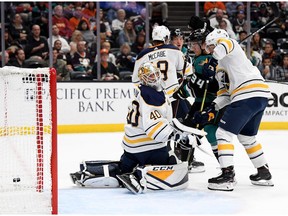 Sam Steel, 34, of the Anaheim Ducks scores his first NHL goal Oct. 21, against Carter Hutton of the Buffalo Sabres.