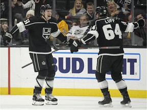 Los Angeles Kings left-winger Austin Wagner, left, celebrates his first NHL goal with right-winger Matt Luff during Wednesday's game against the Colorado Avalanche.
