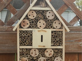 Solitary bee houses come in many shapes and sizes. This bee "mansion" is the bee's knees. (photo by Anne Heathen)