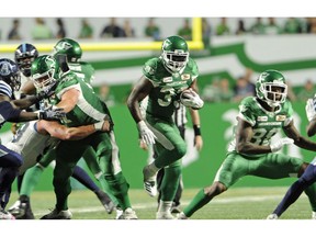 Saskatchewan Roughriders running back Jerome Messam picks up yards during second half season opener CFL action at Mosaic Stadium in Regina on Friday, June 15, 2018. A Calgary judge has ordered that former CFL running back Jerome Messam make a personal appearance in court next week on a charge of voyeurism.