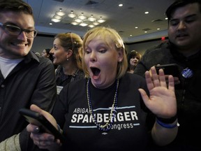 Supporters of Democrat Abigail Spanberger, winner of the 7th Congressional District seat in Virginia, react as their candidate beats incumbent Republican Rep. Dave Brat.