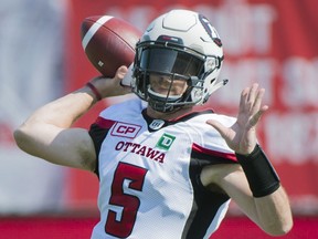 Ottawa Redblacks quarterback Drew Tate throws a pass during first half CFL football action against the Montreal Alouettes in Montreal, Sunday, September 17, 2017.