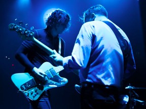 Jack White jams with bassist Dominic Davis at Rogers Place in Edmonton on Friday, Nov. 2.