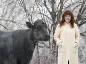 Singer-songwriter Megan Nash poses for a photo near a Joe Fafard sculpture at the MacKenzie Art Gallery. Nash maintains rural roots as she grows her musical career in Saskatchewan and beyond.