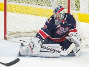 Regina Pats goaltender Max Paddock stops a shot during by Ethan Regnier of the Swift Current Broncos on Saturday night at the Brandt Centre.
