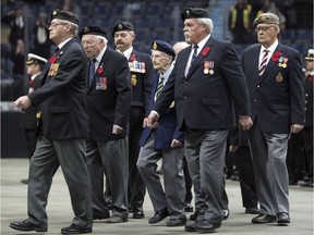 The veterans company marches into the Brandt Centre during the 2018 Remembrance Day ceremonies in Regina.