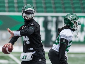 Drew Tate looks to pass during Wednesday's practice with the Roughriders.