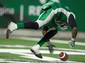 Saskatchewan Roughriders defensive lineman Willie Jefferson (7) does a flip to celebrate disrupting a play during a game against the Ottawa Redblacks at Mosaic Stadium