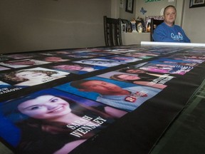 Dave Wensley with the banner created by Families for Justice.