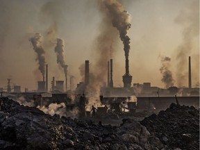 Smoke billows from a large steel plant in Inner Mongolia, China.